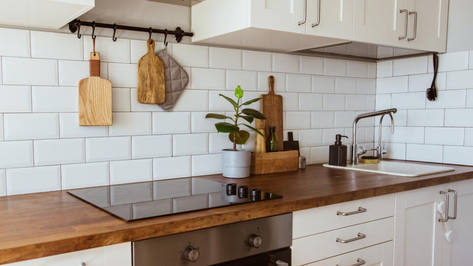 Kitchen,Brass,Utensils,,Chef,Accessories.,Hanging,Kitchen,With,White,Tiles