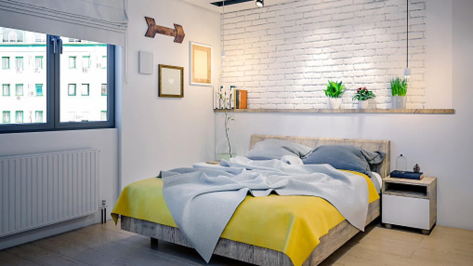 Modern and elegant bedroom with wooden and yellow details. Modern home render