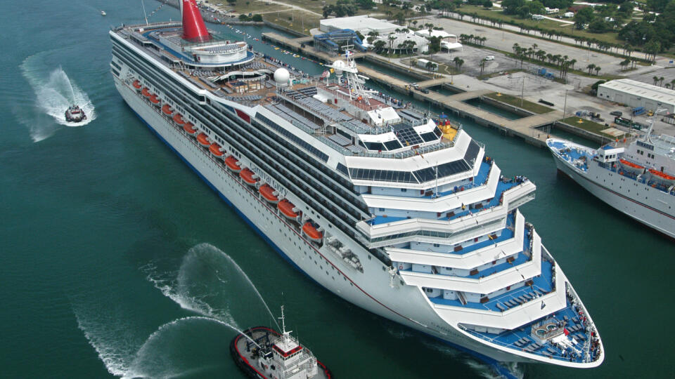 CAPE CANAVERAL, FL - JULY 11: (HANDOUT) Escorted by water-squirting tugs, the new Carnival Glory arrives July 11, 2003 in Cape Canaveral, Florida. Constructed in Monfalcone, Italy, at a cost of $500 million, the 952-foot liner is to be the largest ship sailing weekly Caribbean cruises from Central Florida. It can accommodate more than 3,000 guests and is the 19th ship in the fleet of Miami-based Carnival Cruise Lines. Former astronaut Sally Ride is scheduled to christen the ship Monday, July 14