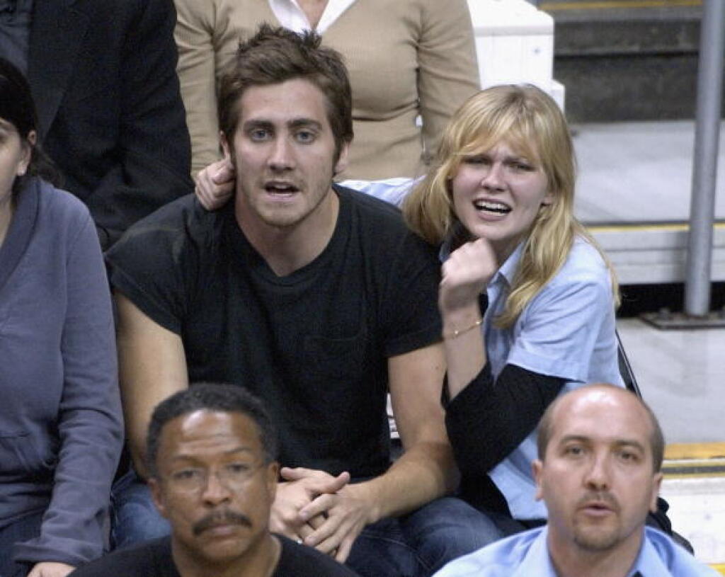 LOS ANGELES - MAY 15: Actor Jake Gyllenhaal and actress Kirsten Dunst attend the Los Angeles Lakers v. San Antonio Spurs NBA playoff game on May 15, 2003 at Staples Center in Los Angeles, California. (Photo by Vince Bucci/Getty Images)
