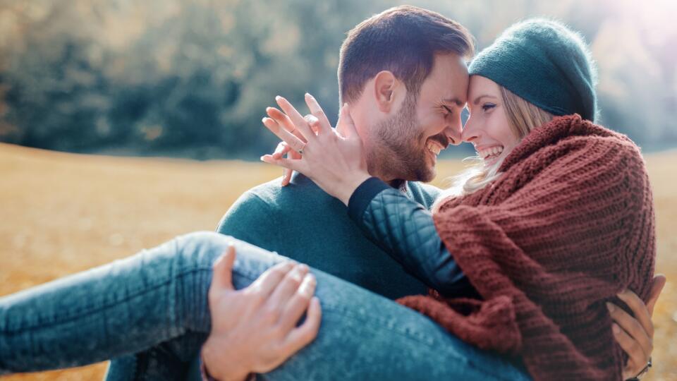 Romantic couple in autumn park. Love, dating, romance.