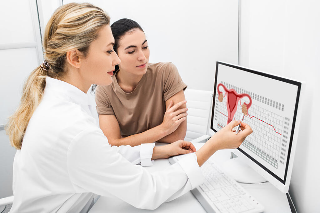 Gynecologist,Communicates,With,Her,Patient,,Indicating,The,Menstrual,Cycle,On