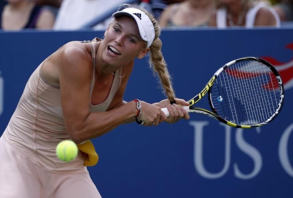 Caroline Wozniacki sa na US Open v roku 2014 nešťastne zamotali vlasy do tenisovej rakety.