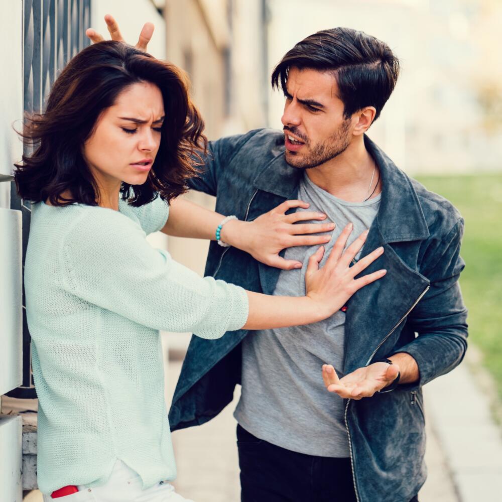 Annoyed boyfriend arguing with his girlfriend