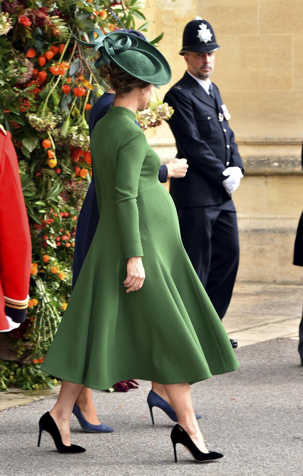 Pippa Matthews departs after the wedding of Princess Eugenie of York and Jack Brooksbank at St George’s Chapel, Windsor Castle, near London, England, Friday Oct. 12, 2018. (Matt Crossick, Pool via AP)