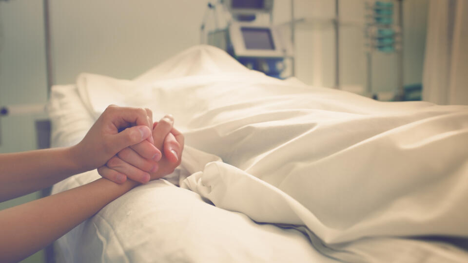 Woman,Mourns,Her,Husband,,Who,Died,In,A,Hospital.