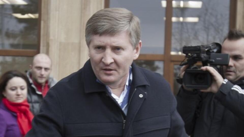 Eastern Ukrainian steel and coal magnate and Shakhtar Donetsk's soccer club owner Rinat Akhmetov, enters a car in Bucharest, Romania, Sunday, Jan. 8, 2012, after visiting the soccer team's coach Mircea Lucescu in hospital following his car accident. Mircea Lucescu, the Romanian coach of Shakhtar Donetsk, has been hospitalized after his SUV was hit by a tram in Bucharest on Friday, Jan. 6, 2012. (AP Photo/Vadim Ghirda)