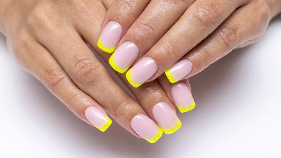 Yellow,French,Manicure,,Sparkles,On,Short,Square,Nails,Closeup,On