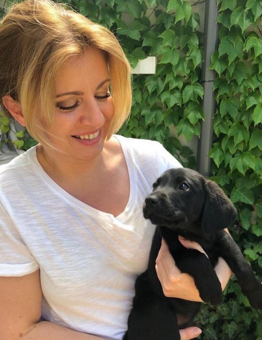 Prezidentka Zuzana Čaputová a jej labrador Leon.