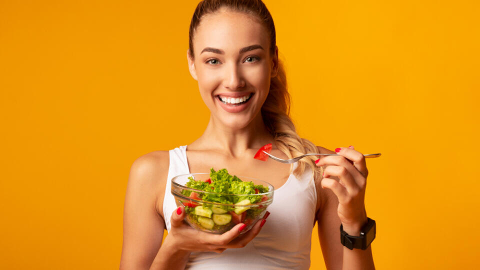 Sport,And,Diet.,Cheerful,Fitness,Girl,Eating,Vegetable,Salad,Standing