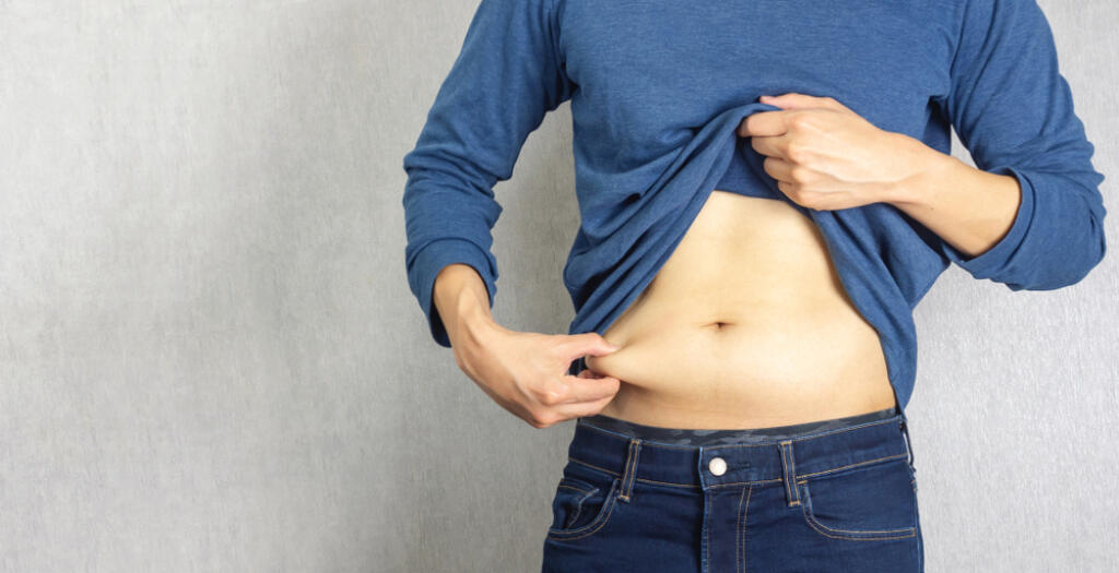 Belly,Fat,Pulled,By,Man,Hand