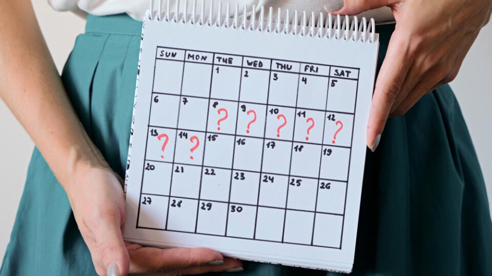 Woman,Holding,Calender,With,Marked,Missed,Period.,Unwanted,Pregnancy,,Woman's