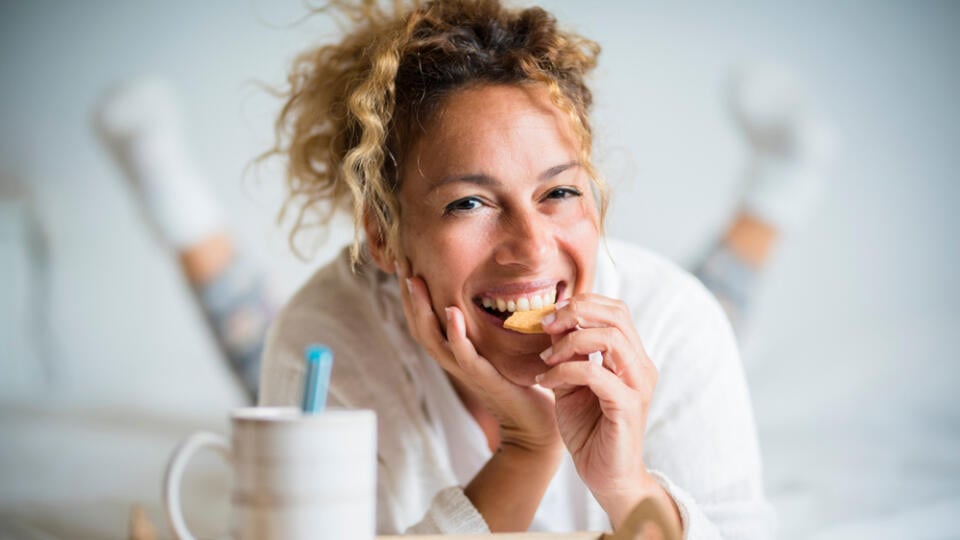 Portrait,Of,Adult,Beautiful,Woman,Eating,Cookie,In,Morning,Breakfast