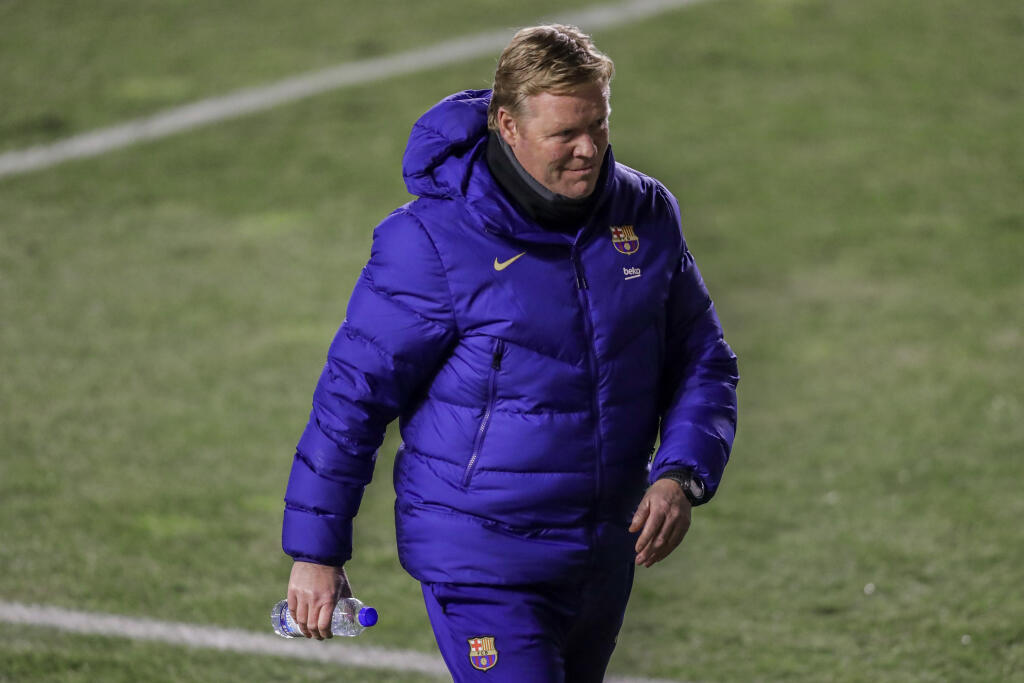 EBE 45 Madrid - Na snímke tréner Barcelony Ronald Koeman v zápase osemfinále Španielskeho pohára vo futbale Rayo Vallecano - FC Barcelona v stredu 27. januára 2021. FOTO TASR/AP
Barcelona's head coach Ronald Koeman during a Spanish Copa del Rey round of 16 soccer match between Rayo Vallecano and FC Barcelona at the Vallecas stadium in Madrid, Spain, Wednesday, Jan. 27, 2021. (AP Photo/Manu Fernandez)