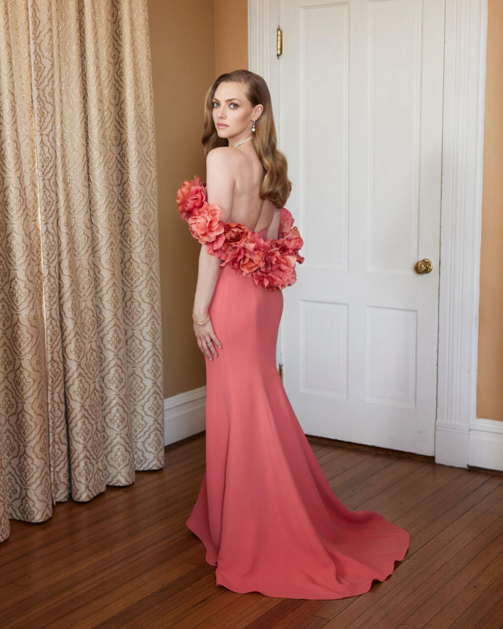 Amanda Seyfried pred 78. výročným udeľovaním Zlatých glóbusov 28. februára 2021.
Oscar de la Renta