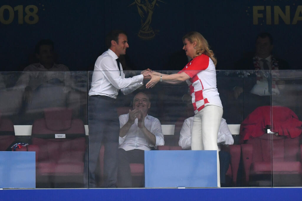 MOSCOW, RUSSIA - JULY 15: French President Emmanuel Macron greets Croatian President Kolinda Grabar-Kitarovic prior to the 2018 FIFA World Cup Final between France and Croatia at Luzhniki Stadium on July 15, 2018 in Moscow, Russia. (Photo by Dan Mullan/Getty Images)