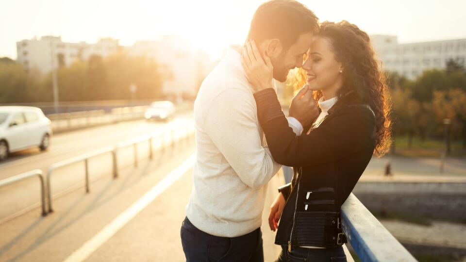 Beautiful couple kissing outdoors