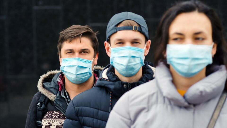 Crowd of people wearing medical masks