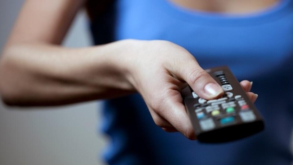 Female Hand With Remote Control. (Photo by: marka/Universal Images Group via Getty Images)
