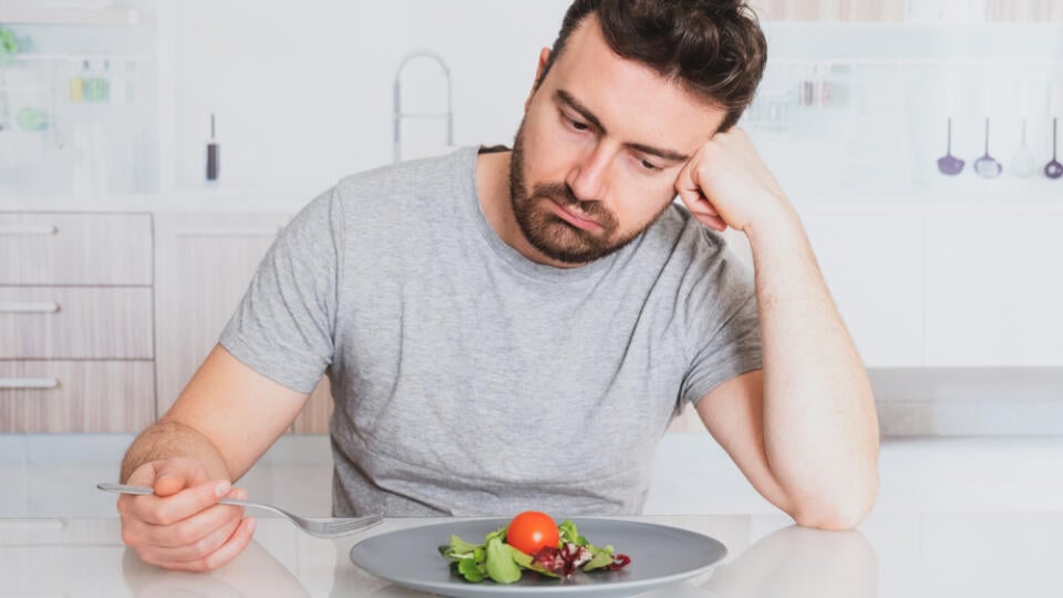 Worried,Man,Hungry,And,Starved,With,Salad