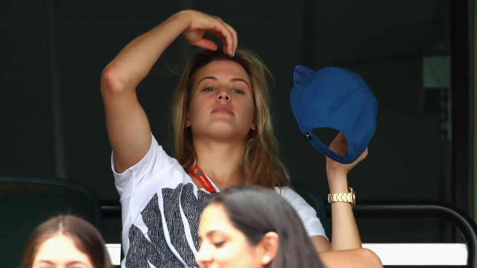 KEY BISCAYNE, FL - MARCH 28: Eugenie Bouchard of Canada watches Grigor Dimitrov of Bulgaria playing against Andy Murray of Great Britain in their third round match during the Miami Open Presented by Itau at Crandon Park Tennis Center on March 28, 2016 in Key Biscayne, Florida. (Photo by Clive Brunskill/Getty Images)