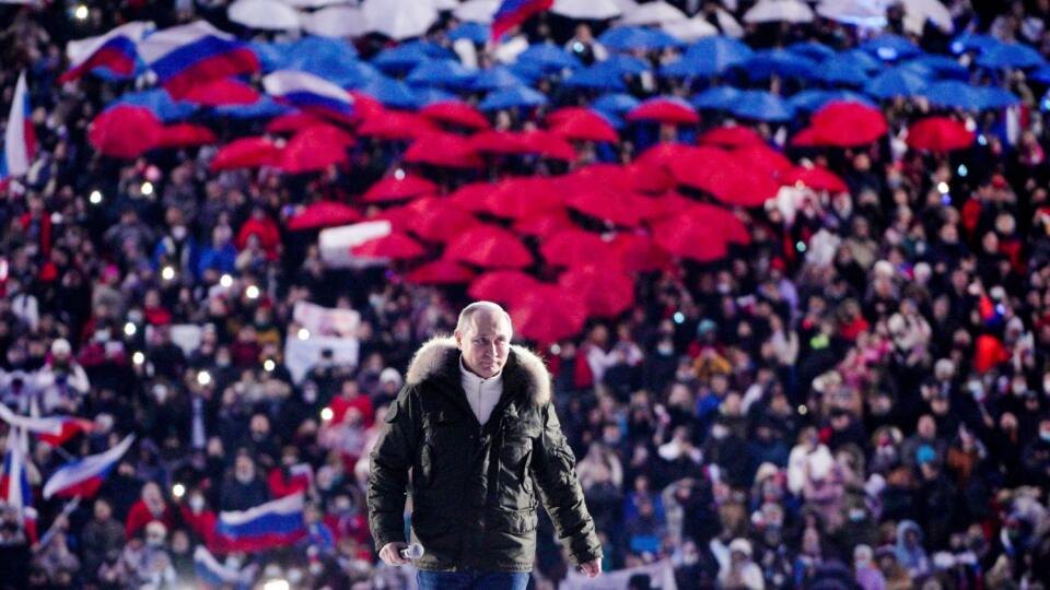 Russian President Vladimir Putin arrives to attend a concert marking the seventh anniversary of the referendum on the state status of Crimea and Sevastopol and its reunification with Russia, in Moscow, Russia