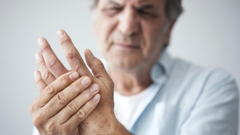 Old,Man,With,Finger,Pain