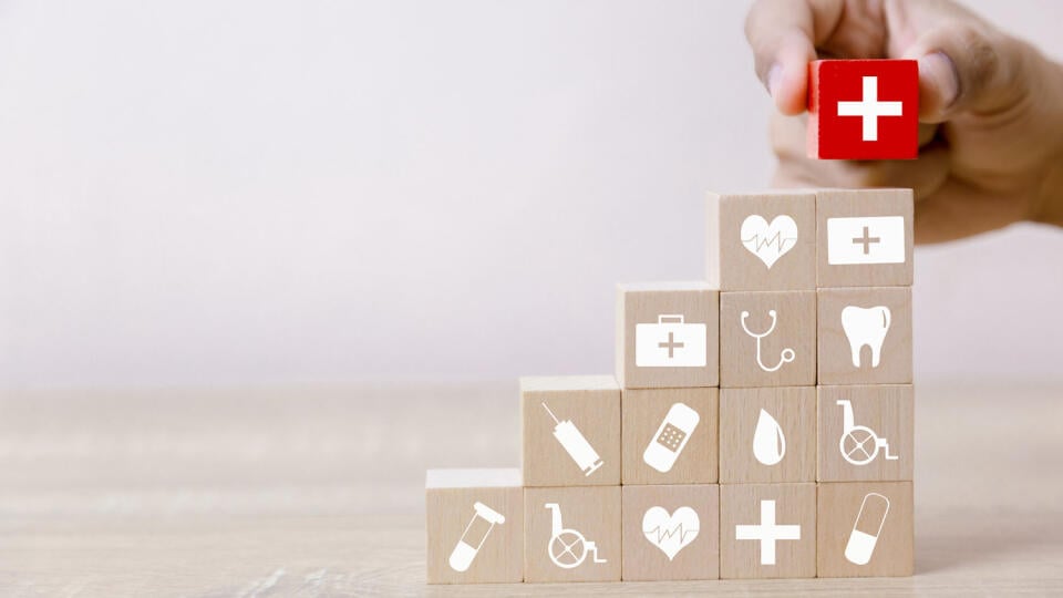 Health,Insurance,Concept,hand,Arranging,Wood,Block,Stacking,With,Icon,Healthcare